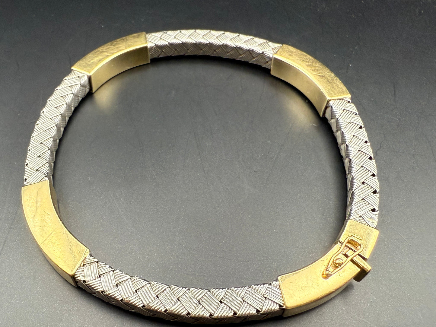 Side profile showing double safety clasp