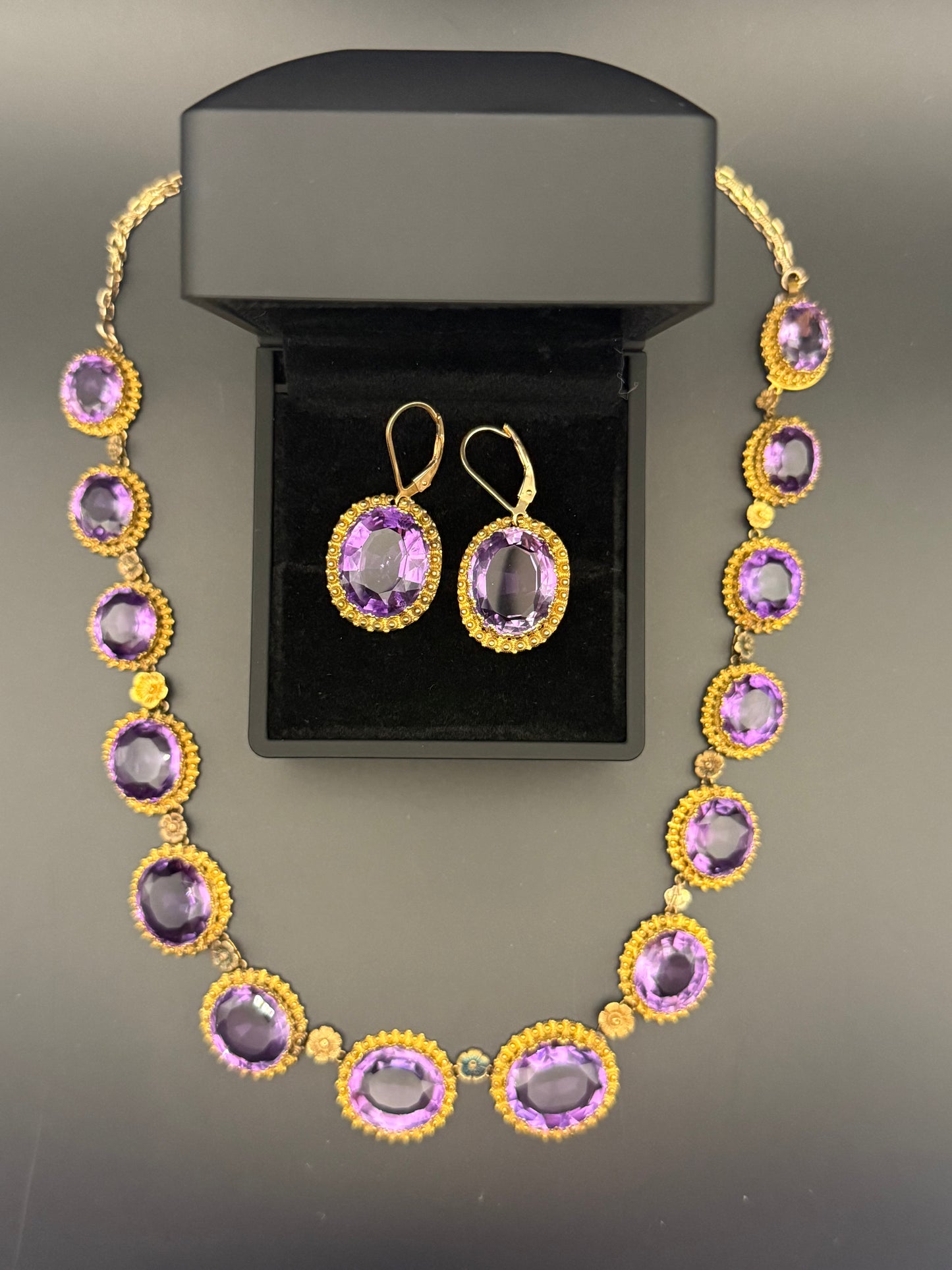 Top view of Victorian amethyst suite with necklace and earrings together