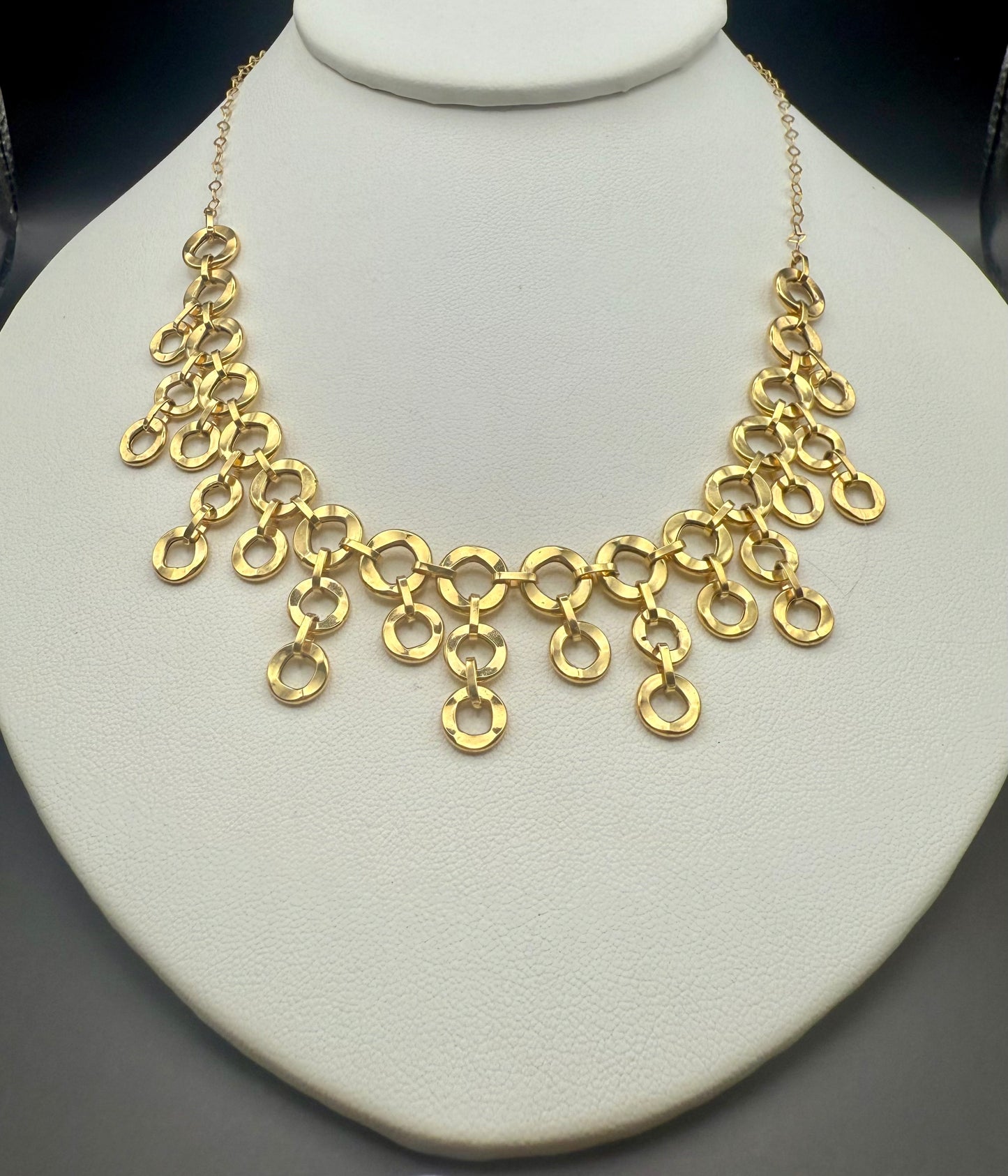 14K Italian Modernist gold bib necklace displayed on white bust