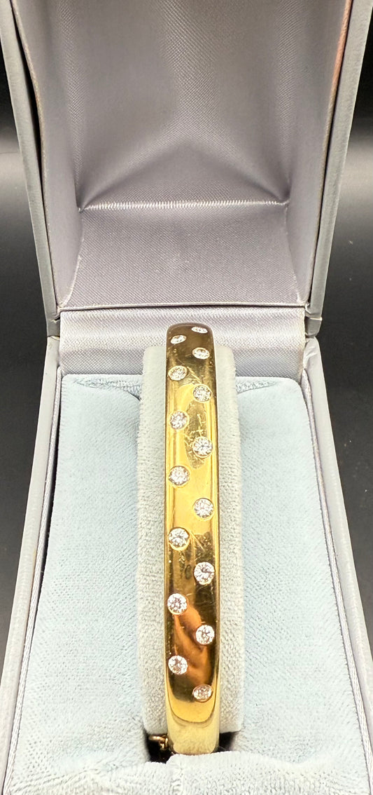 18K yellow gold cuff bracelet with scattered bezel-set diamonds in presentation box