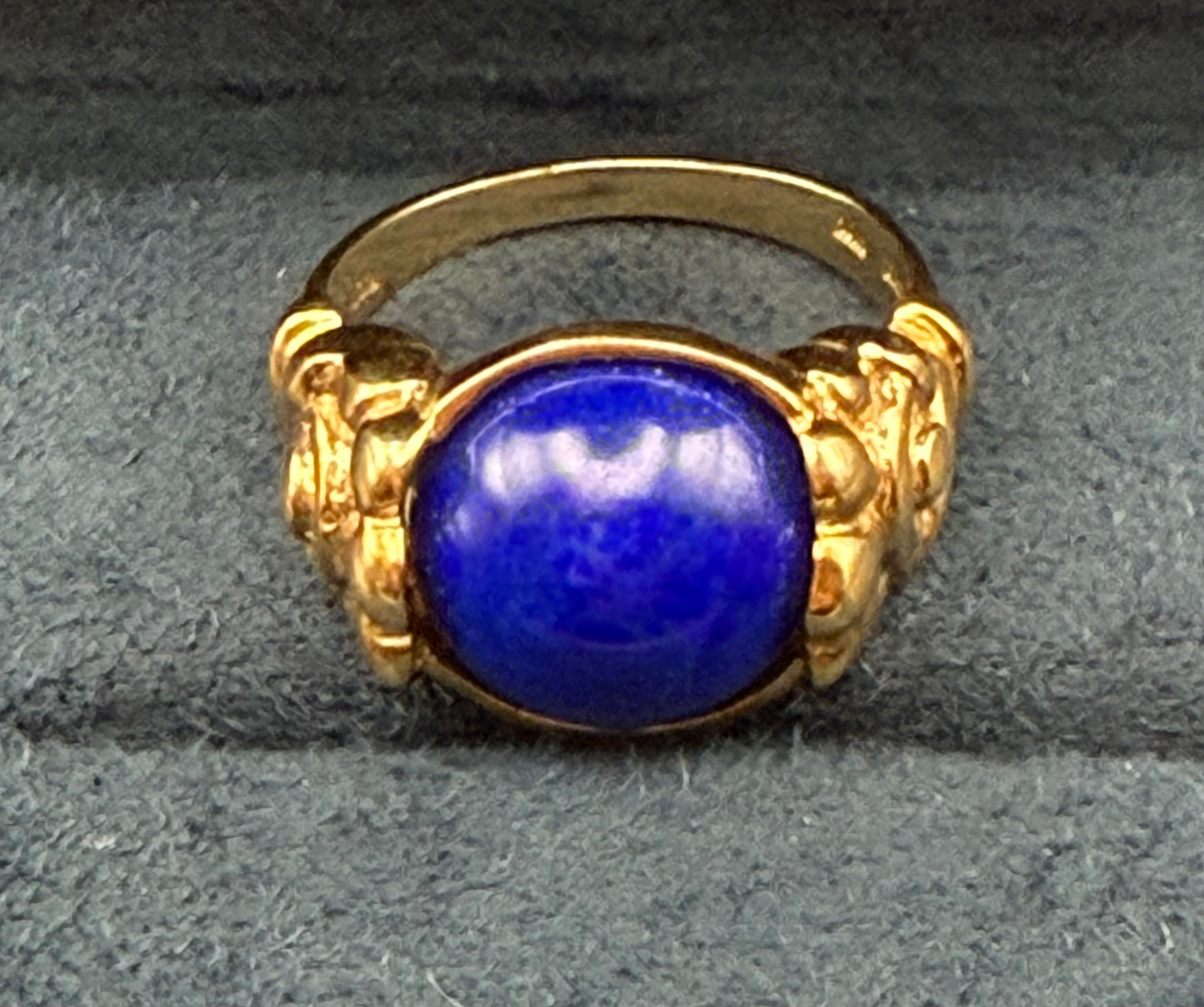 Antique 10K gold ring with rich blue lapis lazuli cabochon, front view.
