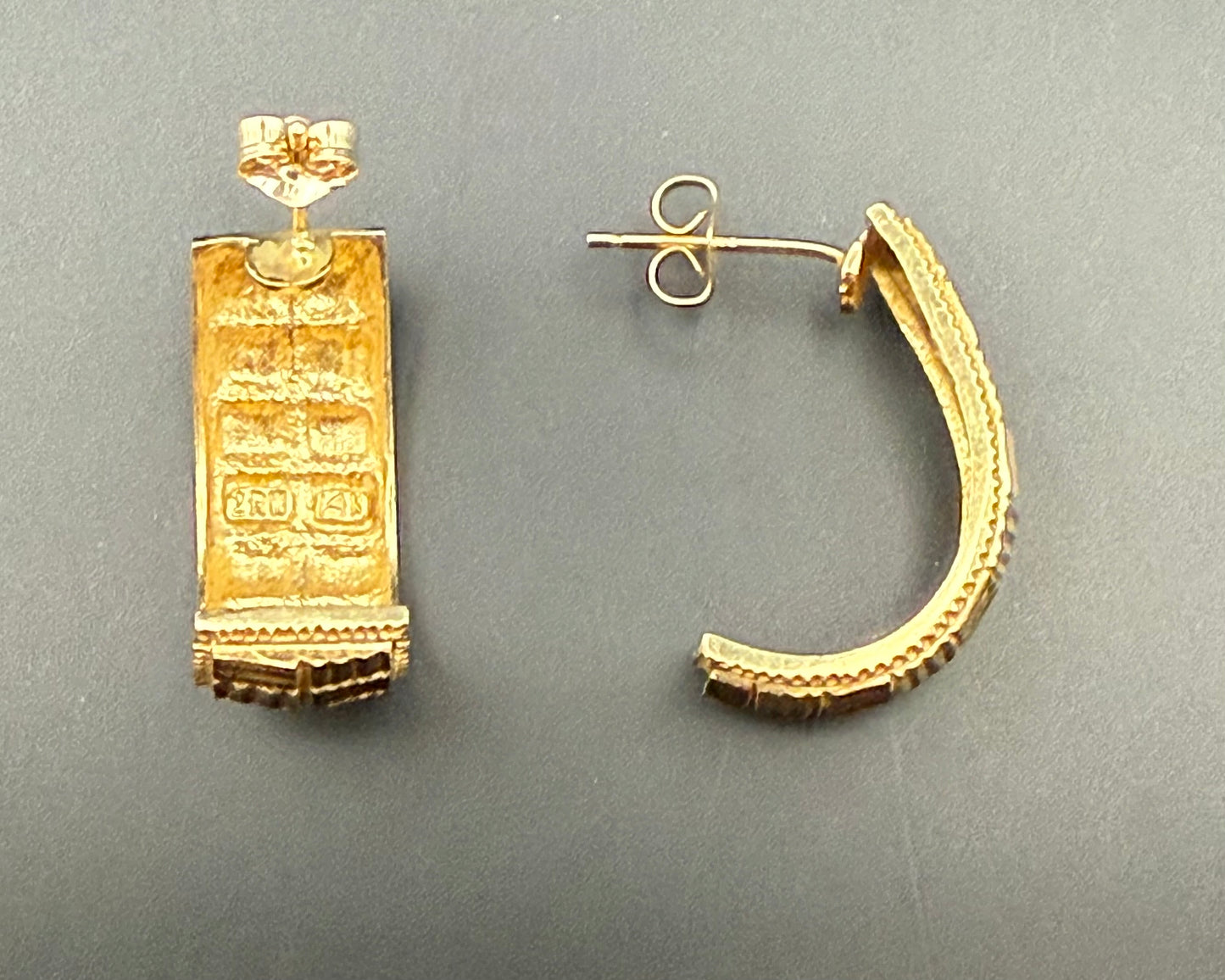 Back view of vintage ZRW 14k gold retro half hoop earrings showing 14k stamp and hallmark