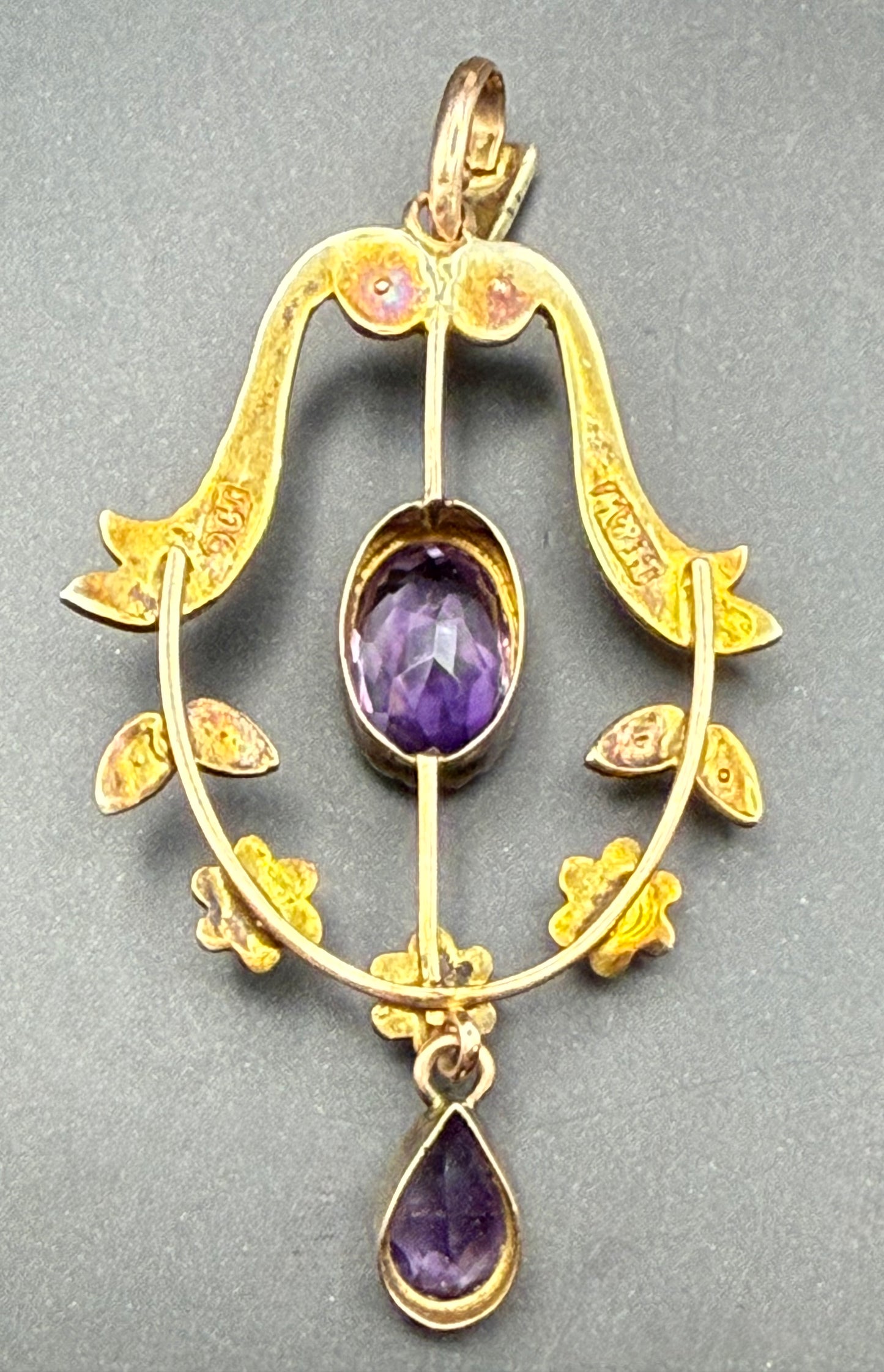 Close-up Back View of amethyst and seed pearl detailing in gold bow design