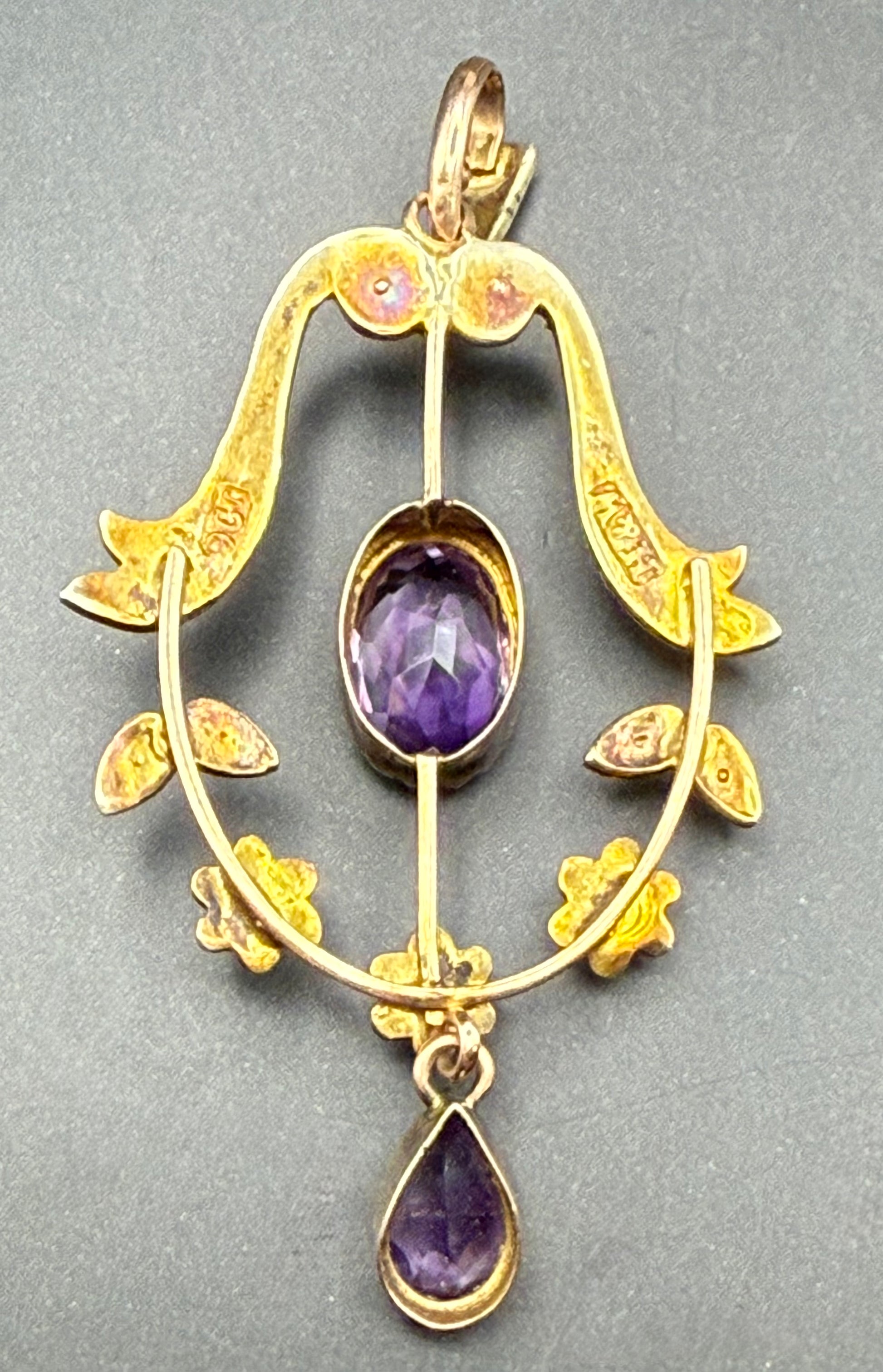 Close-up Back View of amethyst and seed pearl detailing in gold bow design