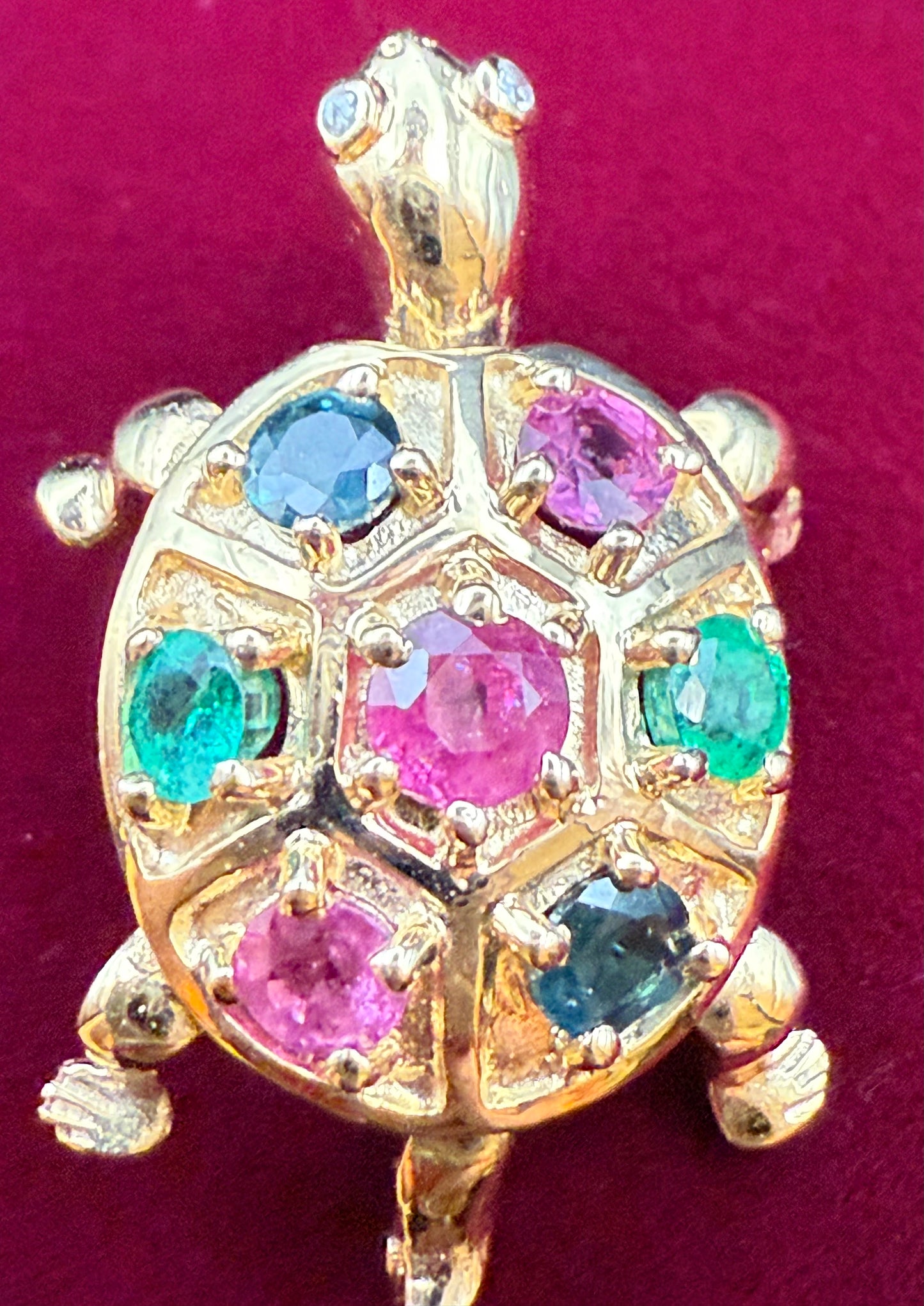 Close-up of shell with rubies, sapphires, emeralds, and diamond eyes