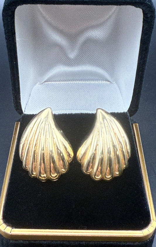 Close-up of vintage 1960’s scallop shell earrings in jewelry box