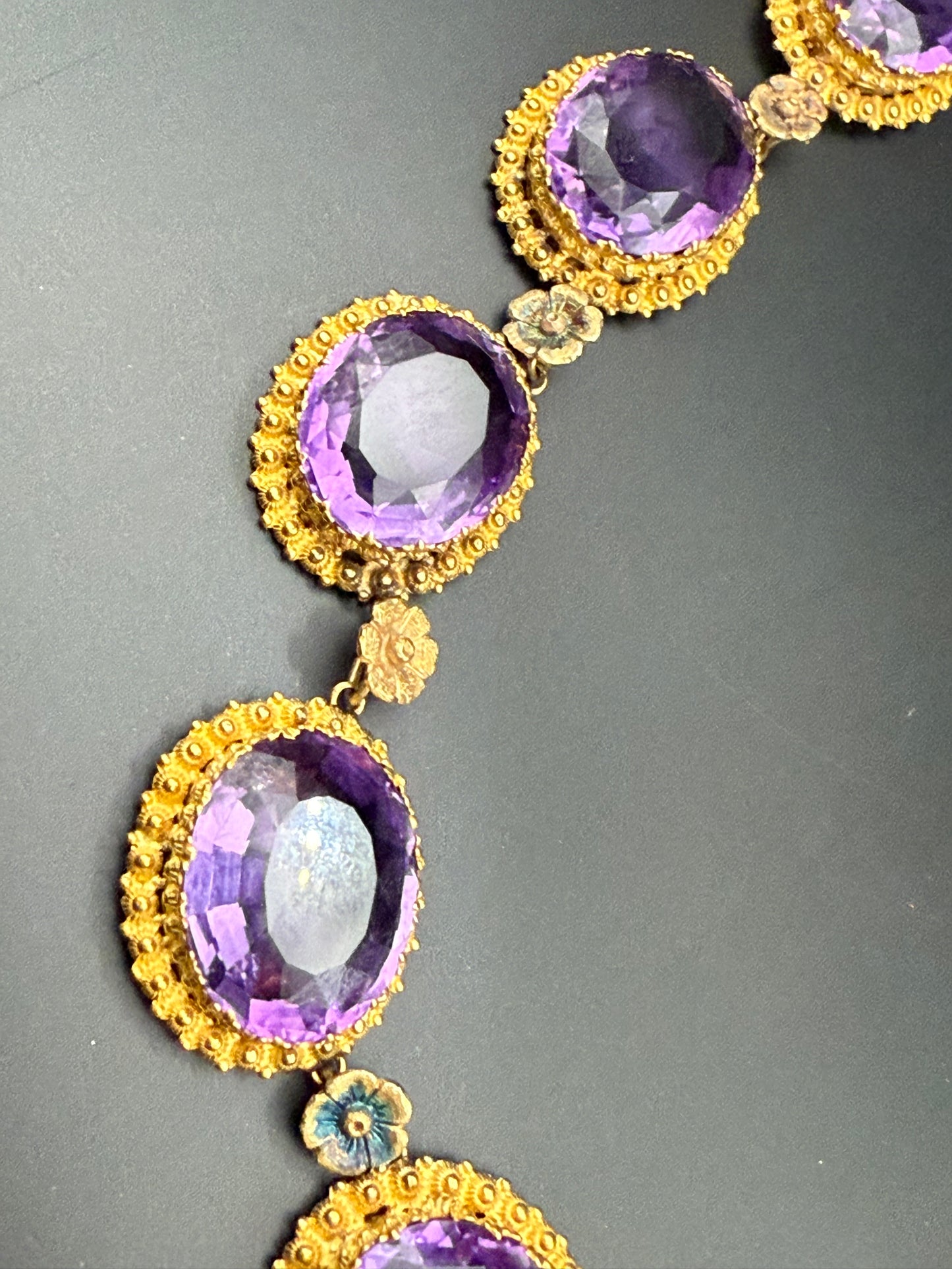 Detail of Victorian necklace with floral gold and enamel accents