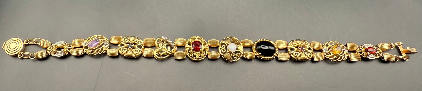 Full-length view of double-chain slide charm bracelet with bead spacers