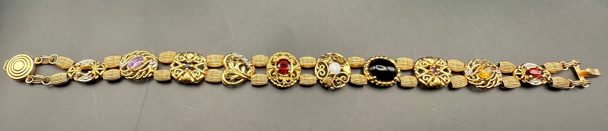 Full-length view of double-chain slide charm bracelet with bead spacers