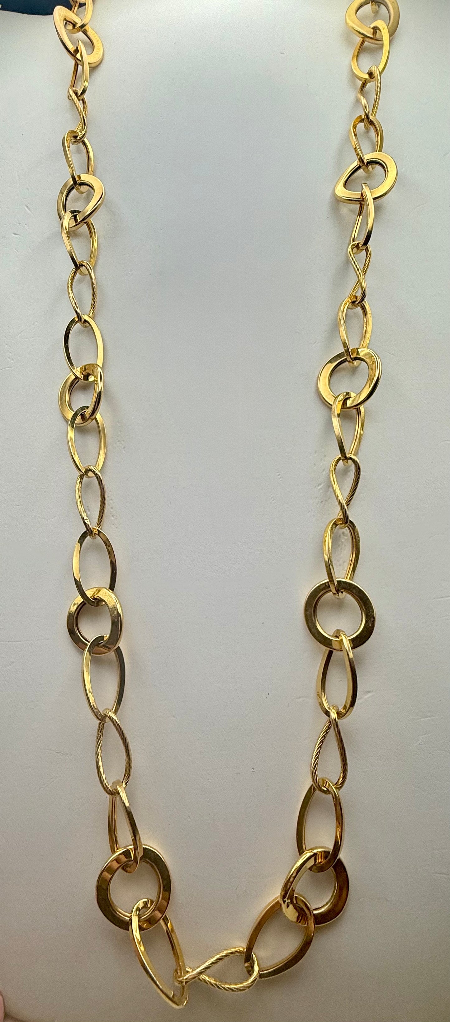 Full 30-inch gold link necklace laid out flat