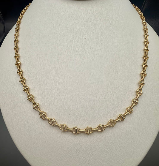 Full view of 14K gold necklace displayed on bust, 24.5-inch length