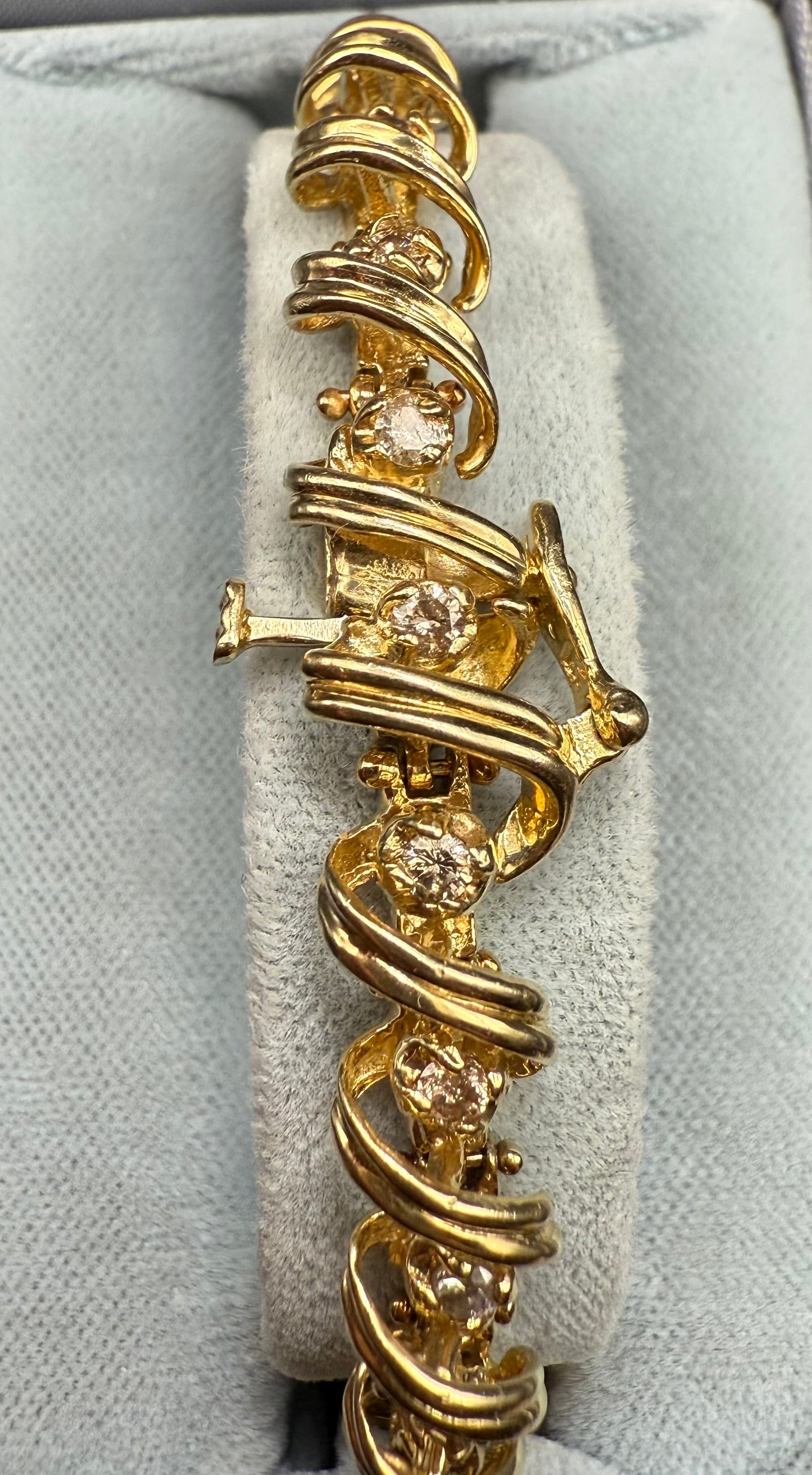 Open view of bracelet showing box clasp and figure-eight safety