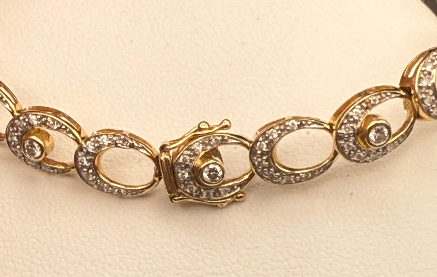 Side angled view of bracelet links highlighting diamond sparkle